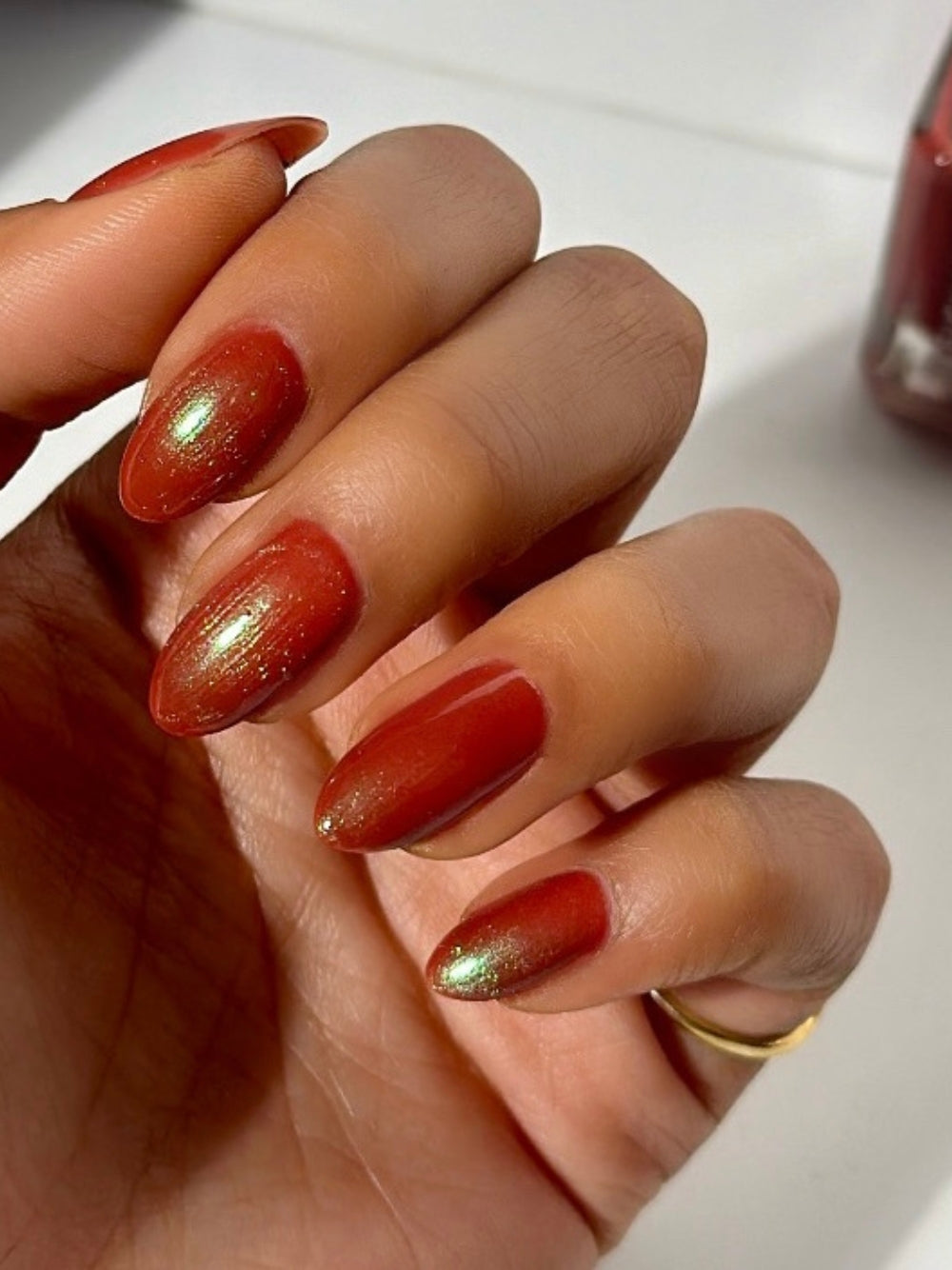 Metallic terracotta red nail polish