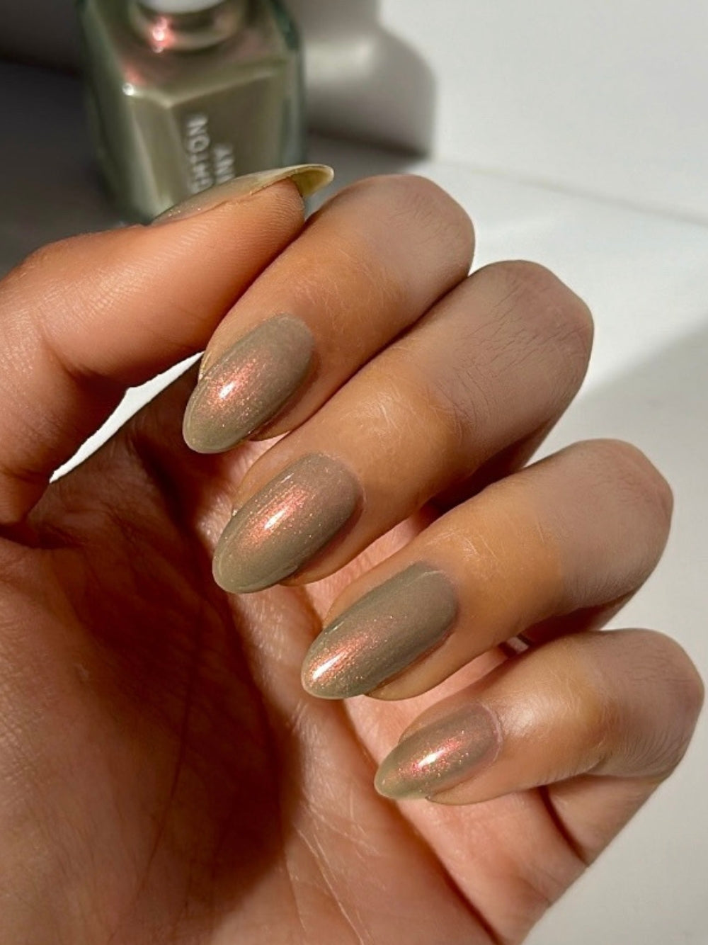 Metallic taupe nail polish