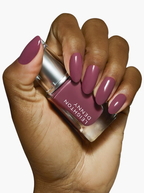 Crushed Grape creamy deep mauve nail colour on nails darker skin tone