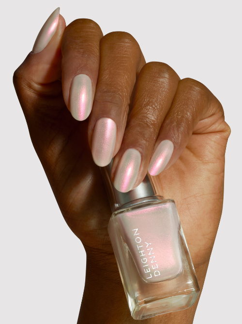 Glazed expression vegan nail polish in bottle & on nails - ivory shimmer which turns to a pink gold when it catches the light. 