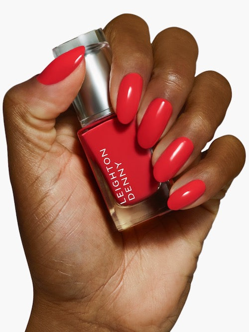 I Love Juicy vibrant coral red nail colour on nails darker skin tone