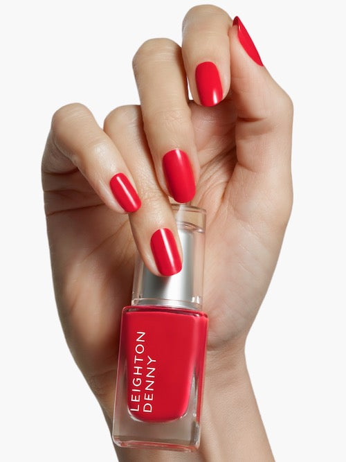 I Love Juicy vibrant coral red nail colour on nails