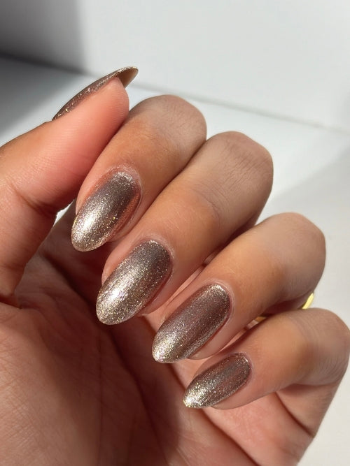 Metallic bronze chrome nail polish Dazzle