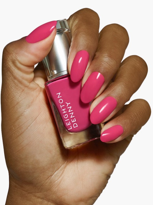 Plush Pink vibrant pink nail colour on nails darker skin tone